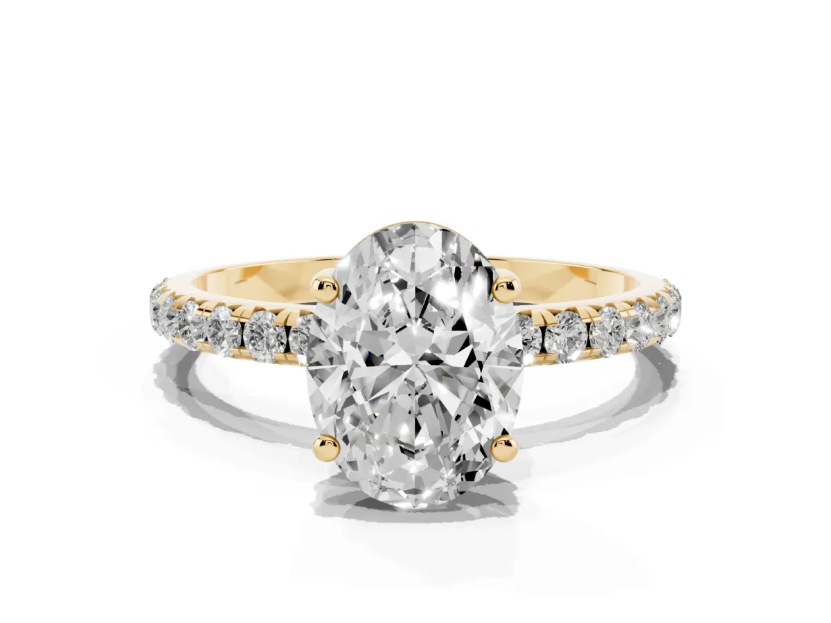 Oval Cut Cut Diamond Solitaire Ring with Micro Pave Band and Four Prong Setting Yellow gold