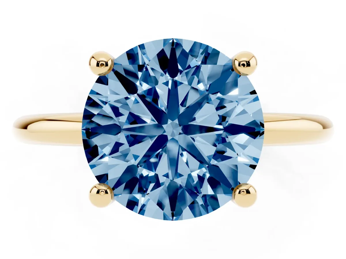 Fancy Blue Round Cut Solitaire Diamond Ring with 4-Prong Setting on a Classic Band Yellow gold