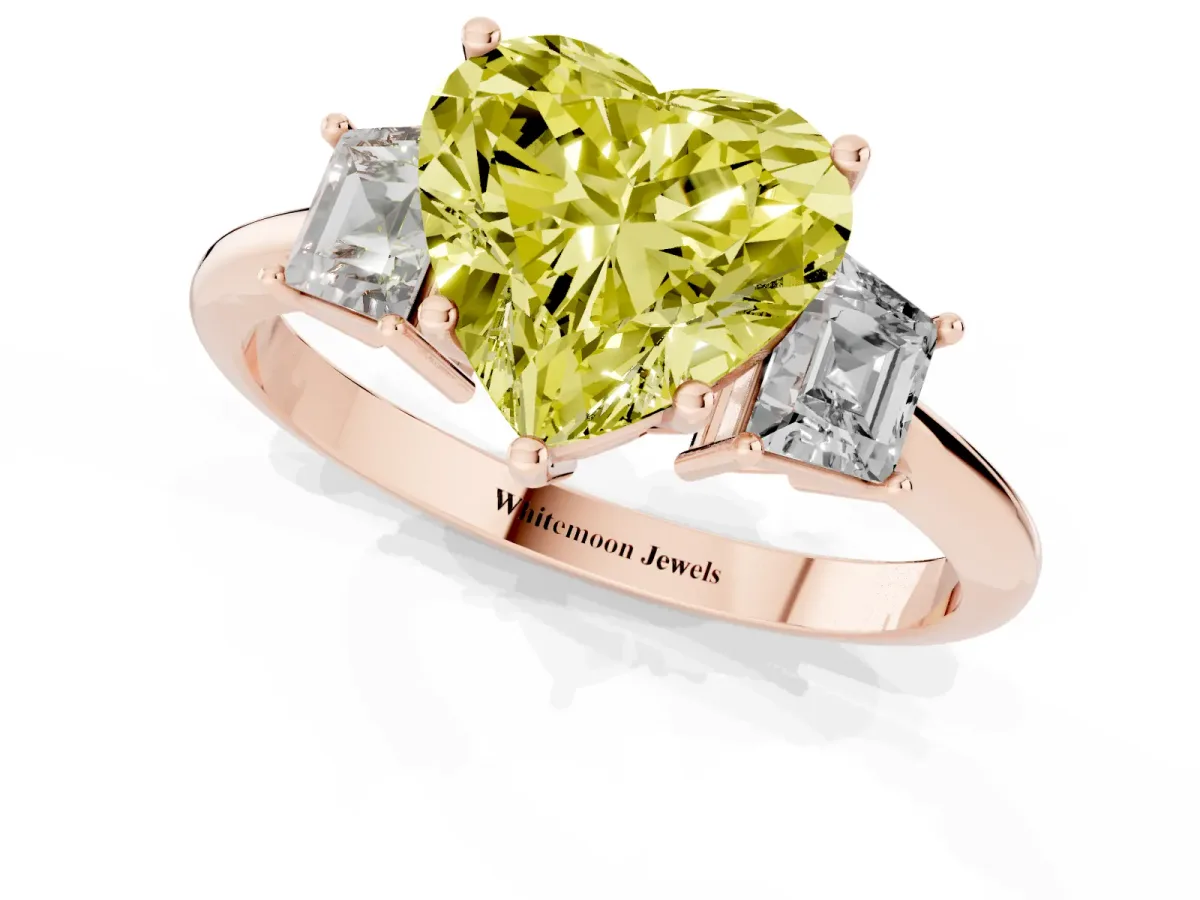 Fancy Yellow Heart Cut Diamond Three-Stone Ring with Trapezoid Side Stones and Prong Setting Rose gold