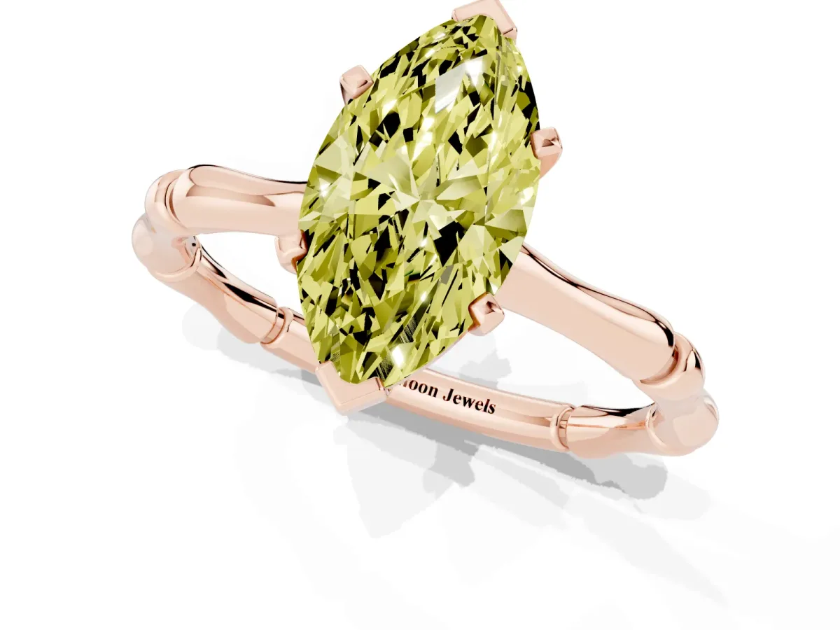 Fancy Yellow Marquise Cut Solitaire Diamond Ring with Bamboo Band and Four-Prong Setting Rose gold