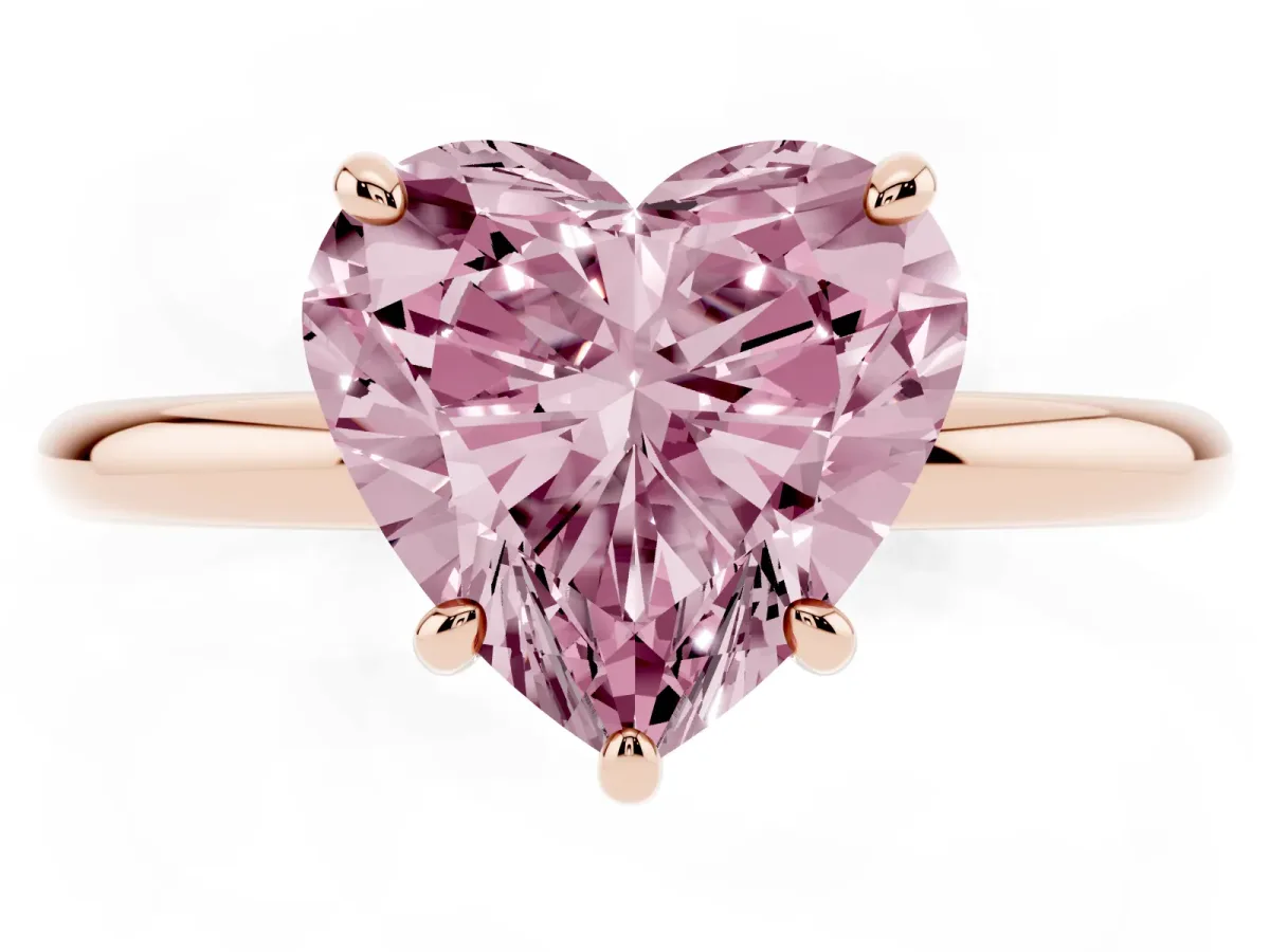 Fancy Pink Heart Cut Solitaire Diamond Ring with Four-Prong Setting on a Plain Band Rose gold