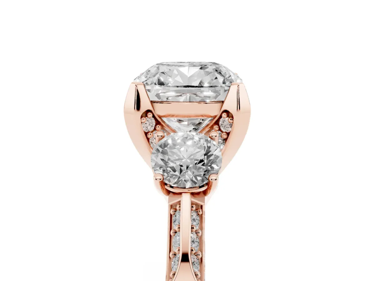 Cushion Cut Brilliant Three-Stone Diamond Ring with Pavé Band and Four-Prong Setting Rose gold
