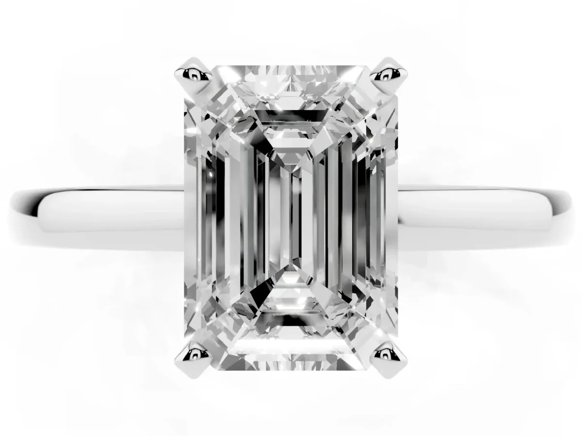 Emerald Cut Solitaire Diamond Engagement Ring with Four-Prong Setting on a Classic Band Silver