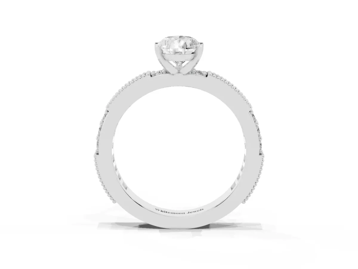 Pear Cut Solitaire with Pavé Band and Four-Prong Setting White gold