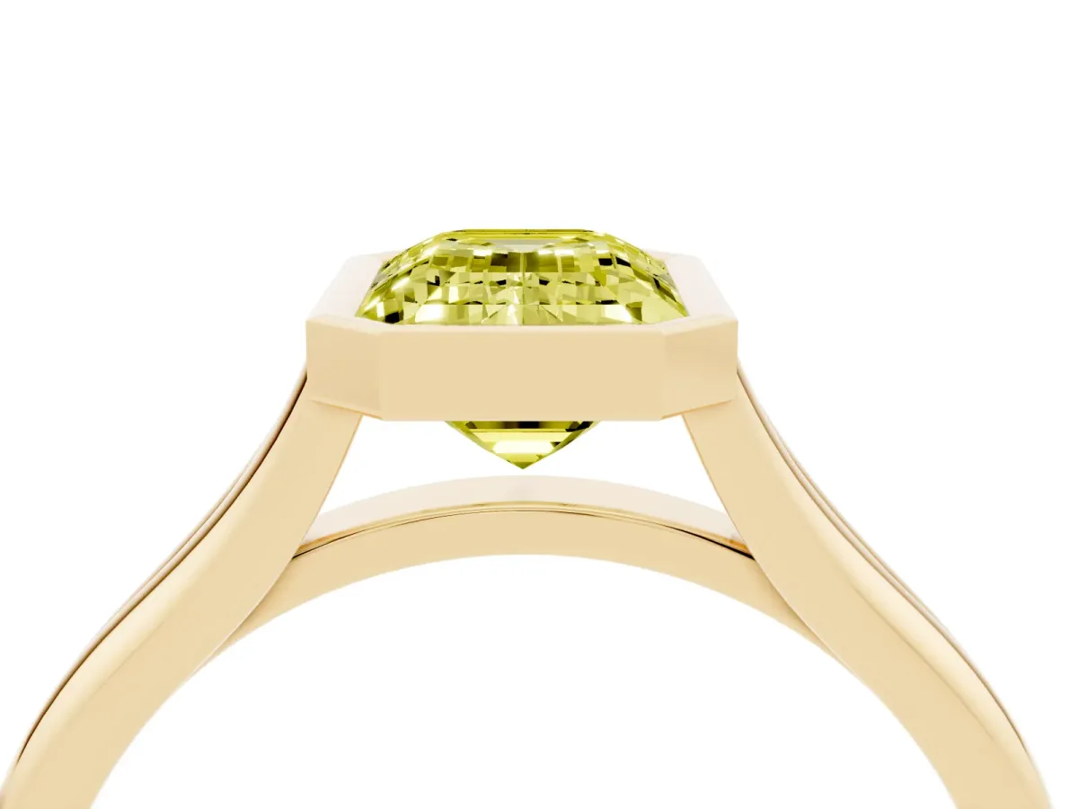 Fancy Yellow Bezel Set Emerald Cut Cut Solitaire Ring with Tapered Band Yellow gold