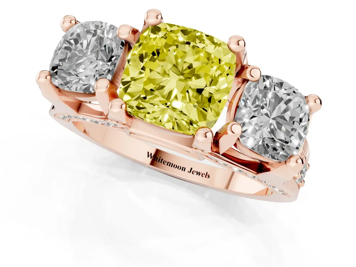 Fancy Yellow Cushion Cut Diamond Three-Stone Ring with Channel Set Band and Four-Prong Setting Rose gold
