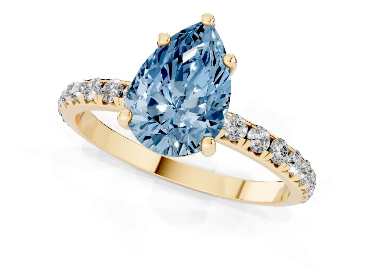 Fancy Blue Pear Cut Cut Diamond Solitaire Ring with Micro Pave Band and Four Prong Setting Yellow gold