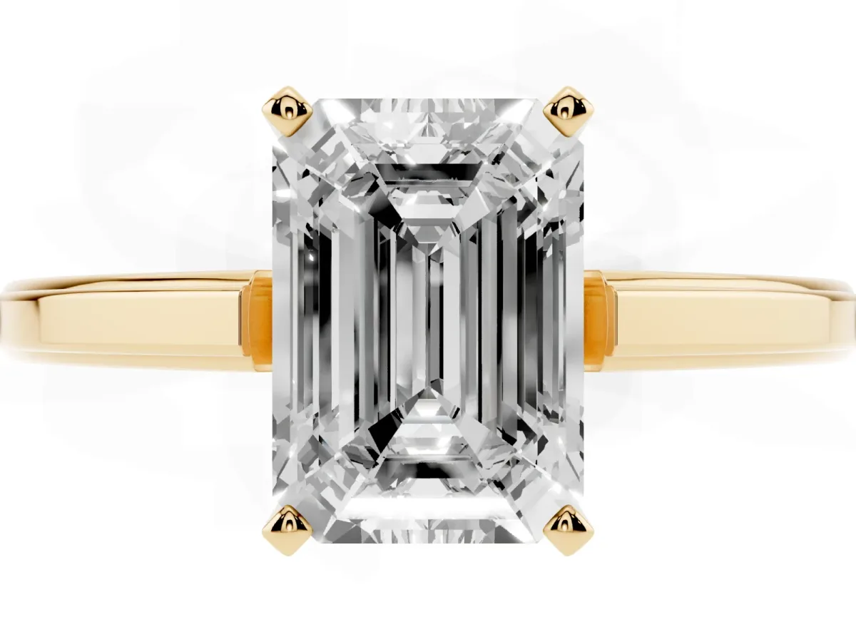 Emerald Cut Solitaire Diamond Ring with Four-Prong Setting and Classic Band Yellow gold