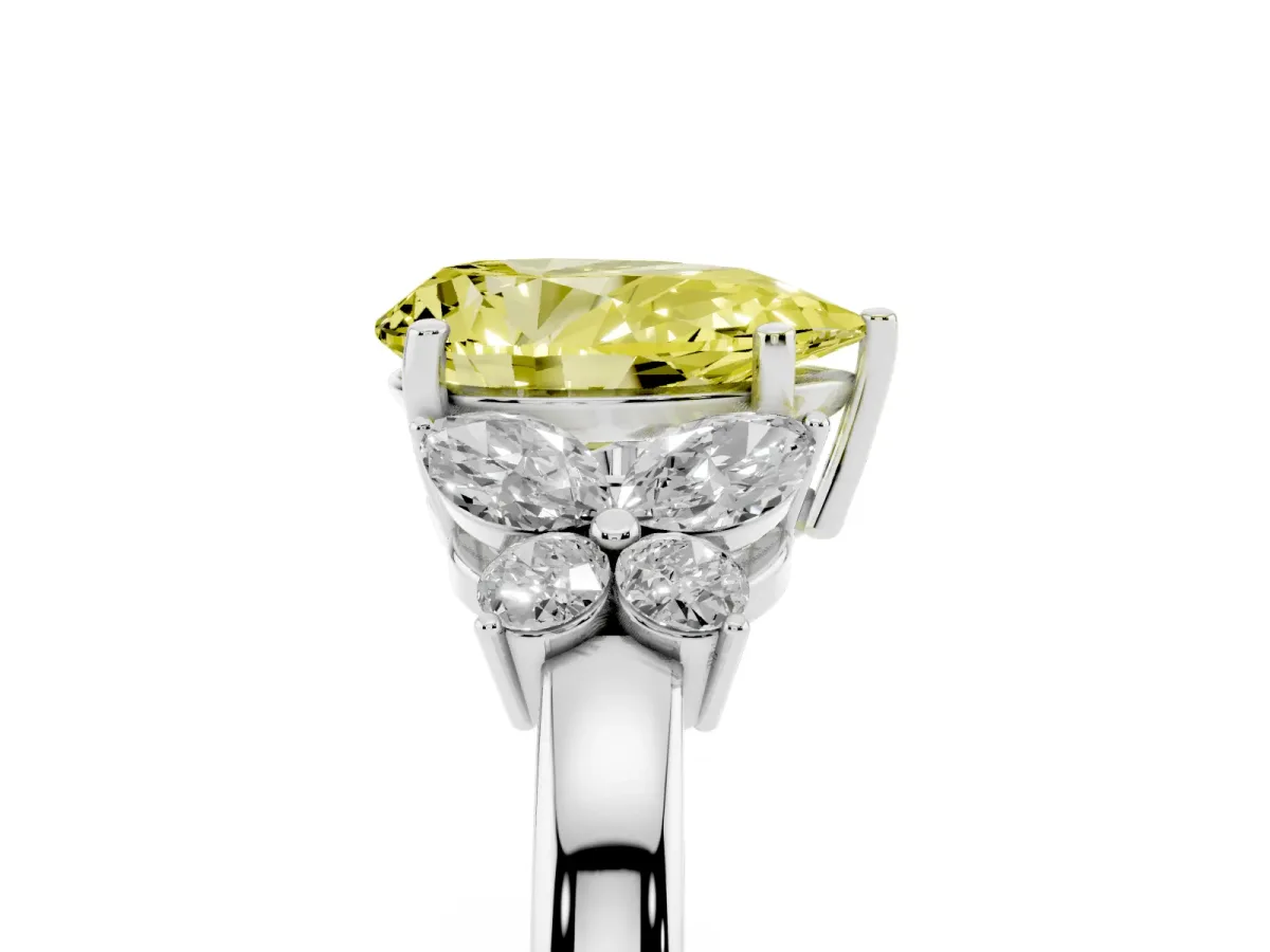 Fancy Yellow Pear Cut Cut Solitaire Floral Diamond Ring with Four-Prong Setting Platinum