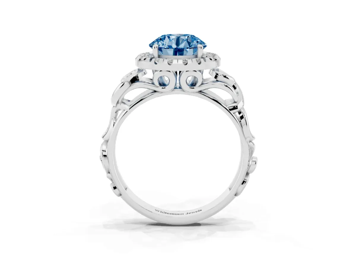 Fancy Blue Round Cut Cut Halo Diamond Ring with Scrollwork Band and Four-Prong Setting Platinum