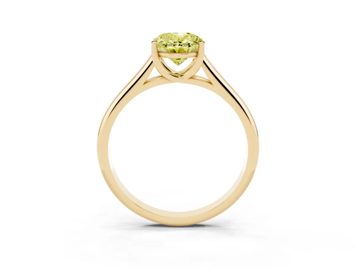Fancy Yellow Oval Cut Solitaire Engagement Ring with Tapered Band and Four-Prong Setting Yellow gold