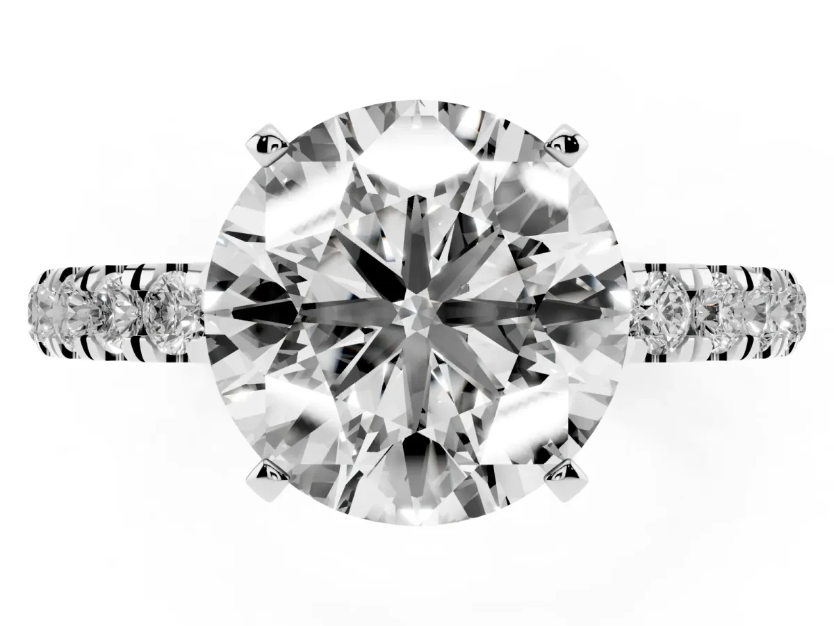 Round Cut Diamond Solitaire Ring with Pavé Accents and Four-Prong Setting Silver