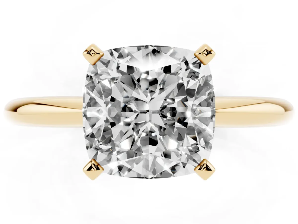 Cushion Cut Diamond Solitaire Ring with Prong Setting and Classic Band Yellow gold