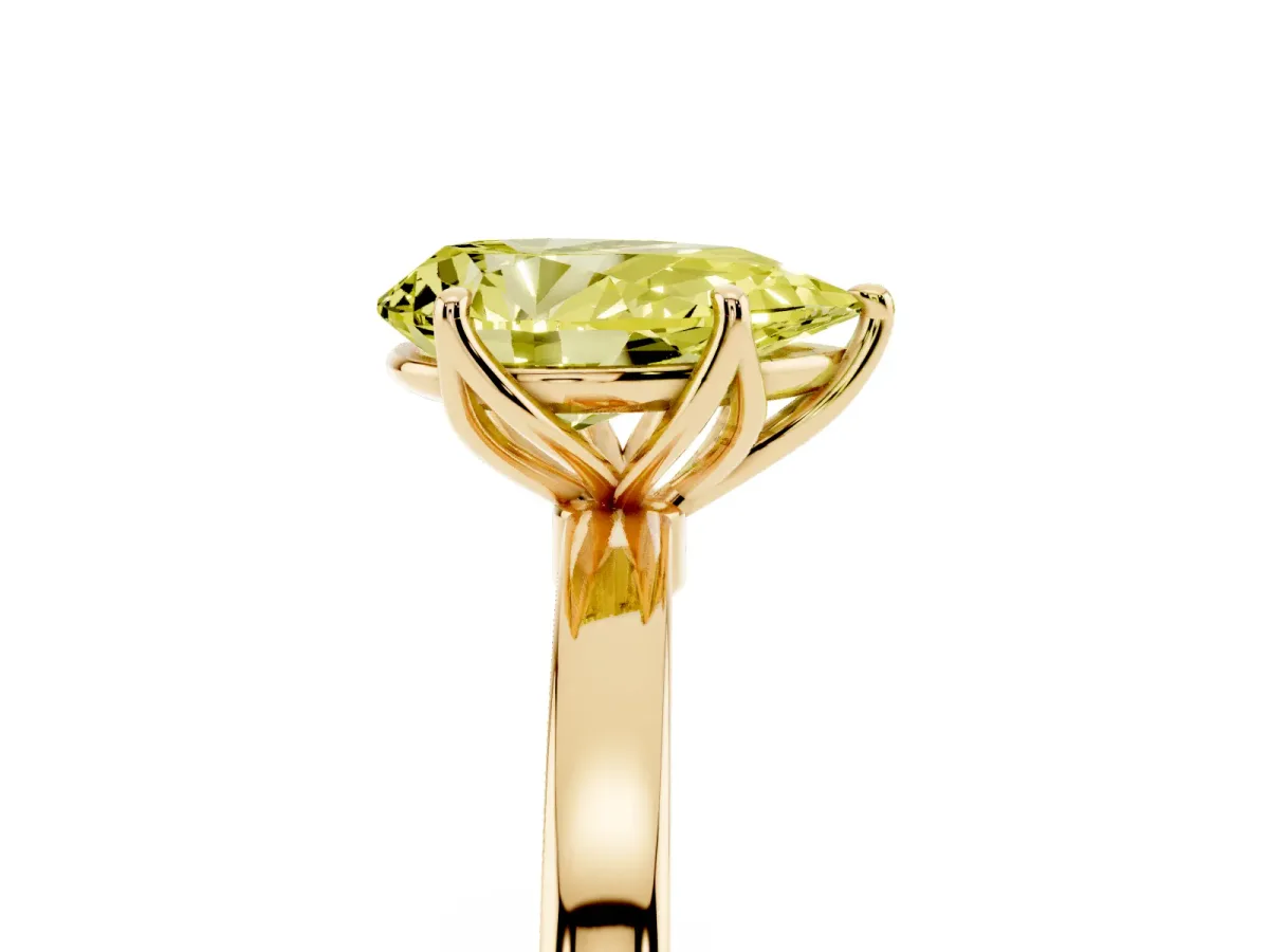 Fancy Yellow Pear Cut Diamond Solitaire Ring with Thin Band and Prong Setting Yellow gold