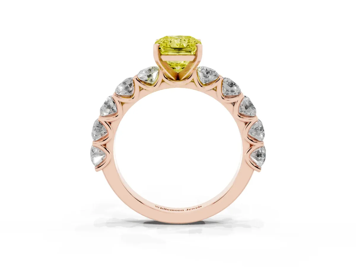 Fancy Yellow Radiant Cut Diamond Prong Setting with Side Stones on a Pave Band Rose gold