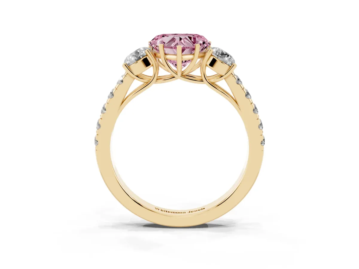 Fancy Pink Heart Cut Cut Diamond Three-Stone Ring with Round Side Stones and Pavé Band Yellow gold