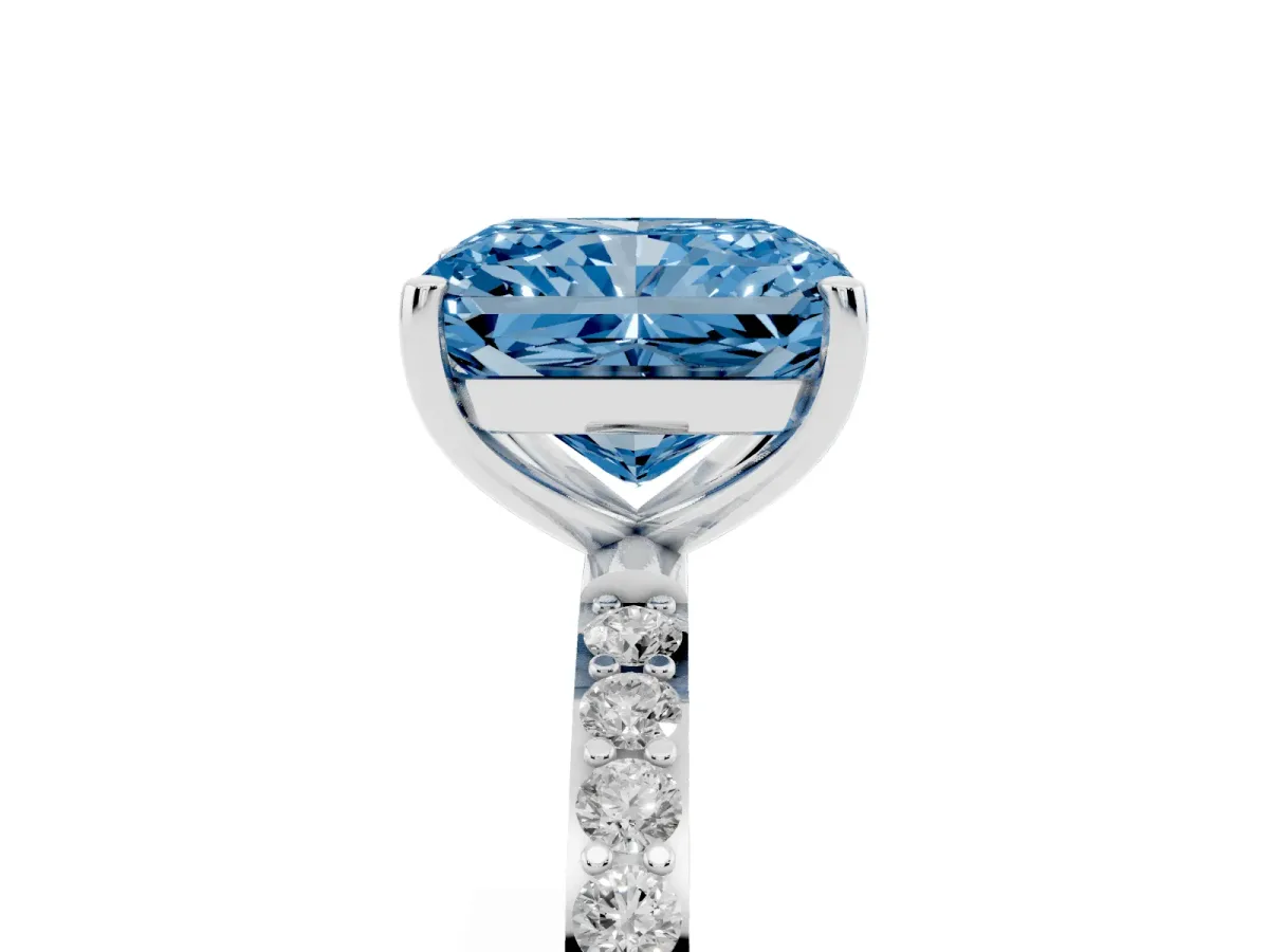 Fancy Blue Radiant Cut Diamond Solitaire Ring with Round Pavé Shoulders and Prong Setting Silver