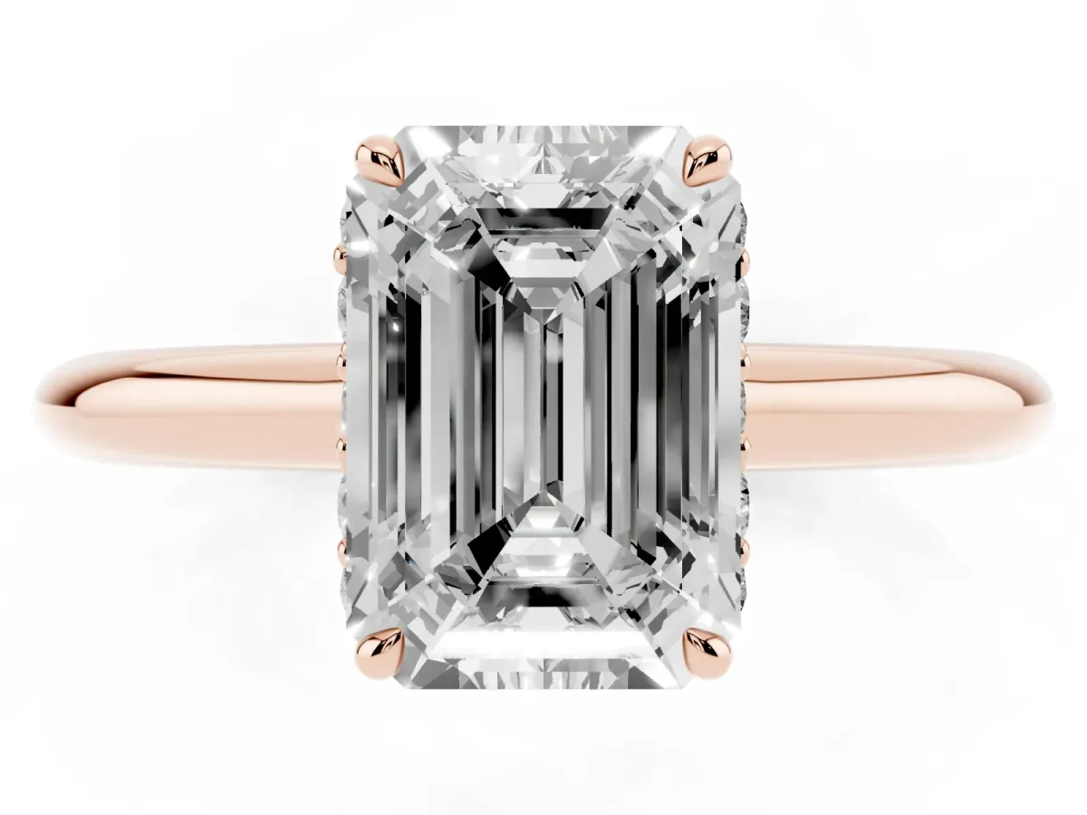 Emerald Cut Brilliant Solitaire Engagement Ring with Six-Prong Setting and Classic Band Rose gold