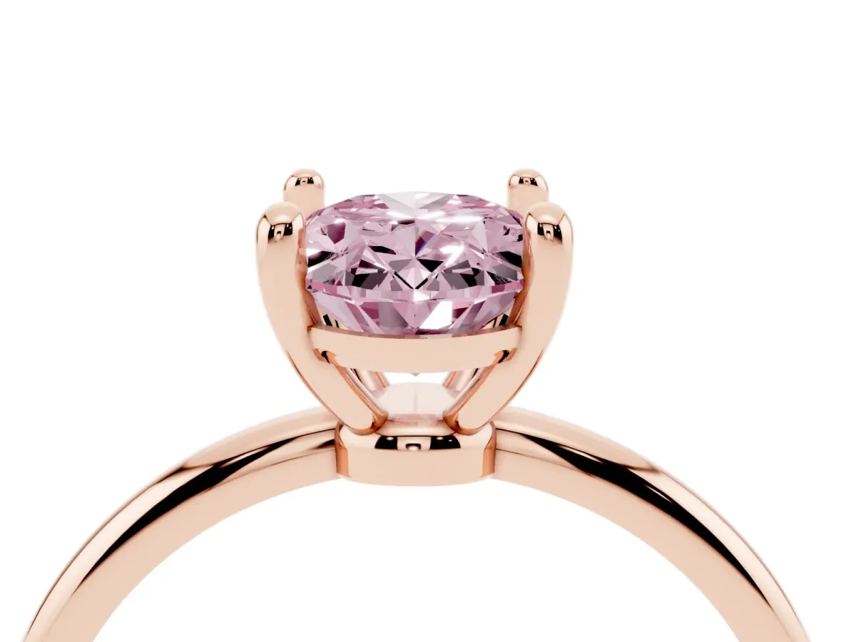 Fancy Pink Oval Cut Solitaire Diamond Ring with 4-Prong Setting on a Classic Band Rose gold