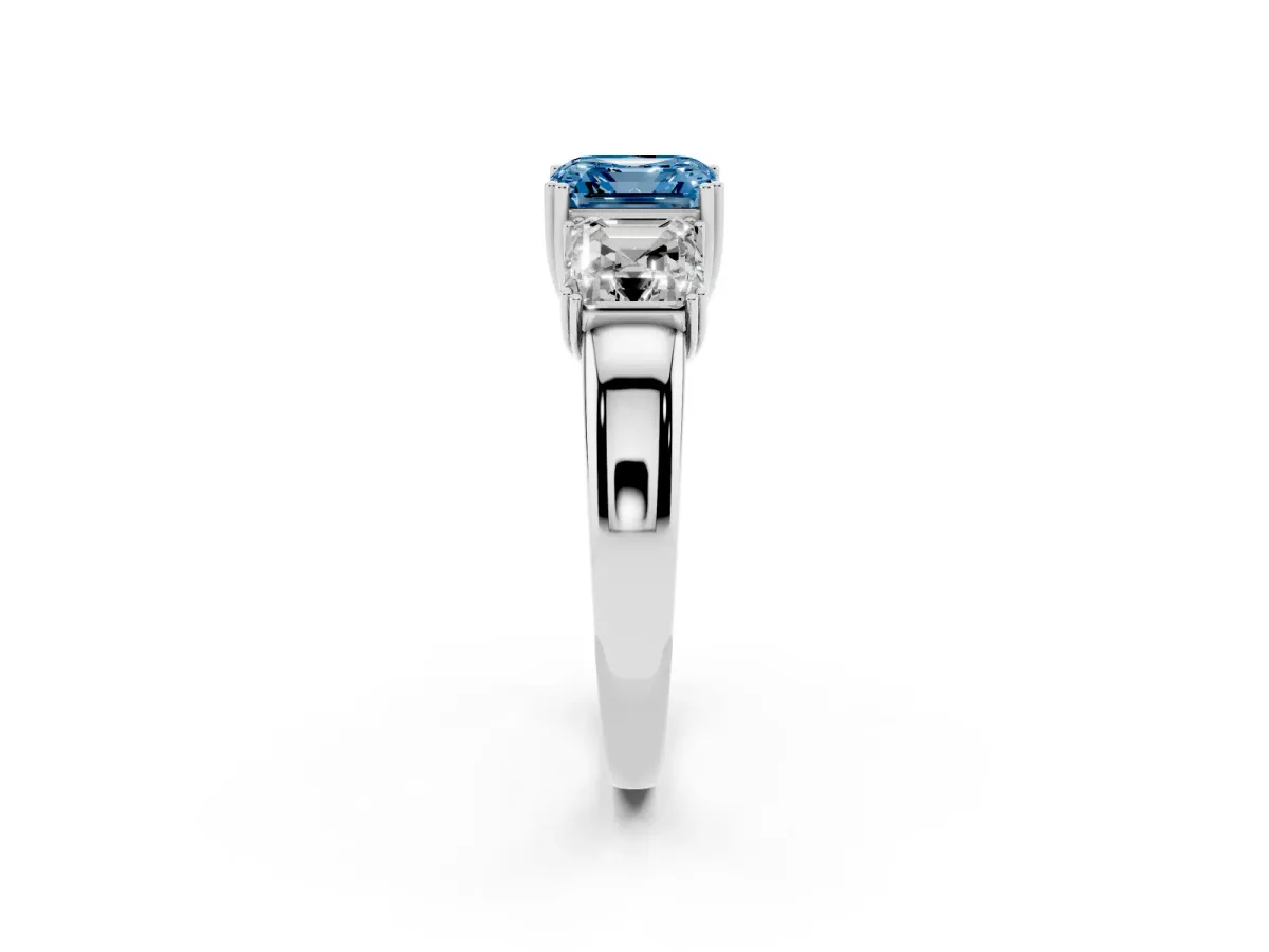 Fancy Blue Three-Stone Asscher Cut Cut Diamond Ring with Channel Set Band and Four-Prong Setting Silver
