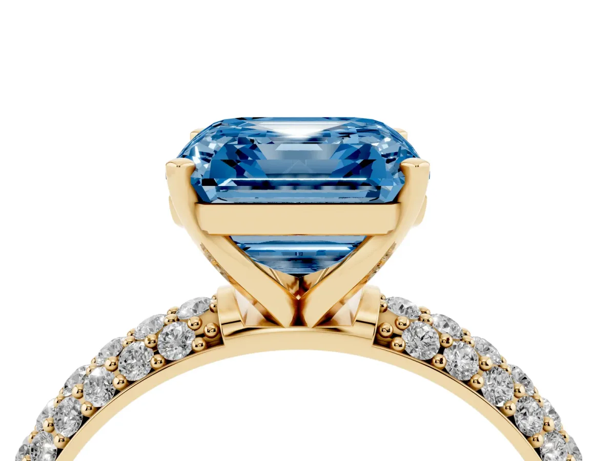 Fancy Blue Asscher Cut Diamond Solitaire Ring with Prong Setting and Pavé Band Yellow gold