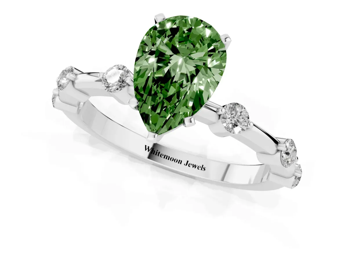 Fancy Green Pear Cut Solitaire Diamond Ring with Bezel Set Side Stones and Prong Setting Platinum