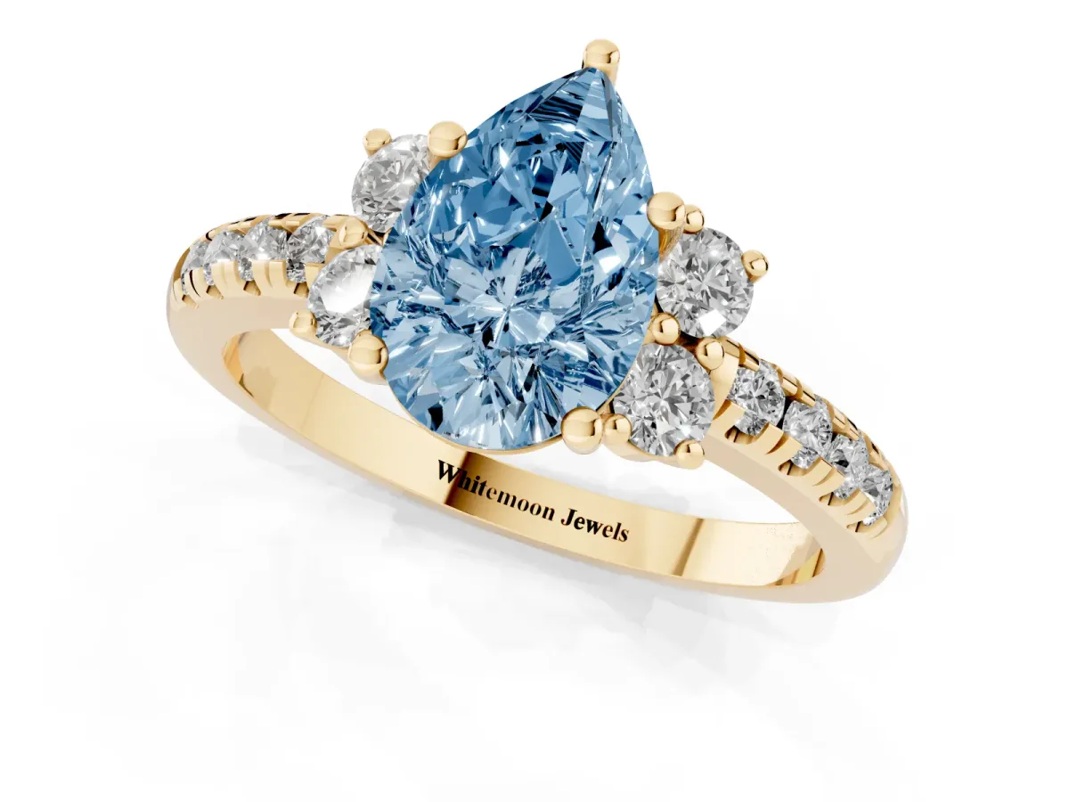 Fancy Blue Pear Cut Diamond Three-Stone Pave Band with Four-Prong Setting Yellow gold