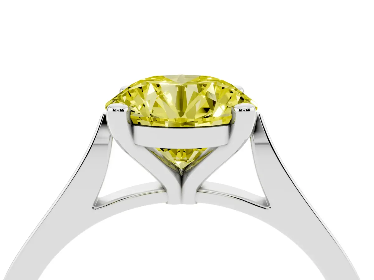 Fancy Yellow Round Cut Solitaire Diamond Ring with Four-Prong Setting and Tapered Band Silver