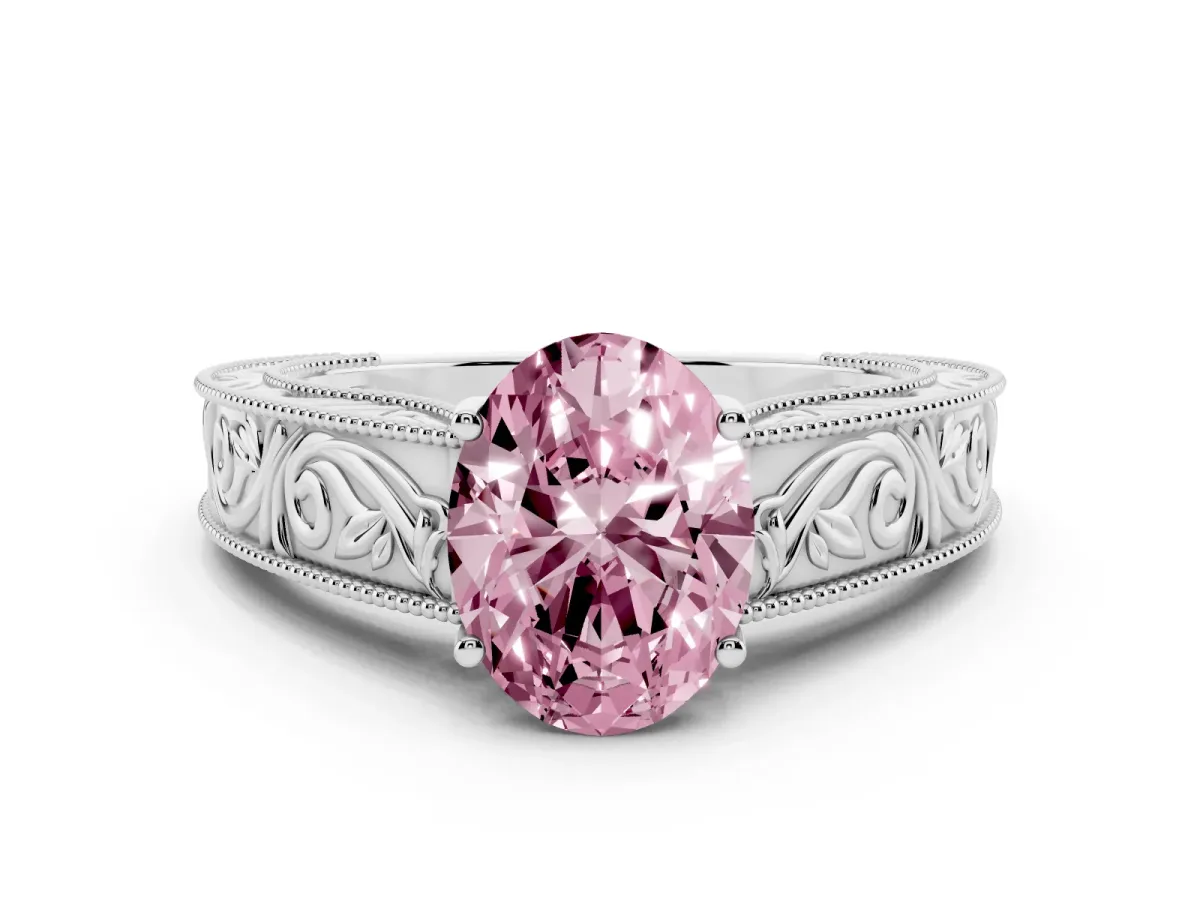 Fancy Pink Oval Cut Diamond Solitaire Ring with Engraved Band and Four-Prong Setting Silver