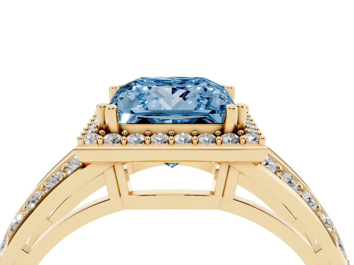 Fancy Blue Princess Cut Diamond Halo Ring with Split Shank Pavé Band and Four-Prong Setting Yellow gold
