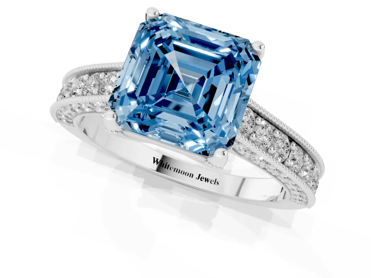 Fancy Blue Asscher Cut Cut Diamond Solitaire Ring with Milgrain Pave Band and Four Prong Setting Silver