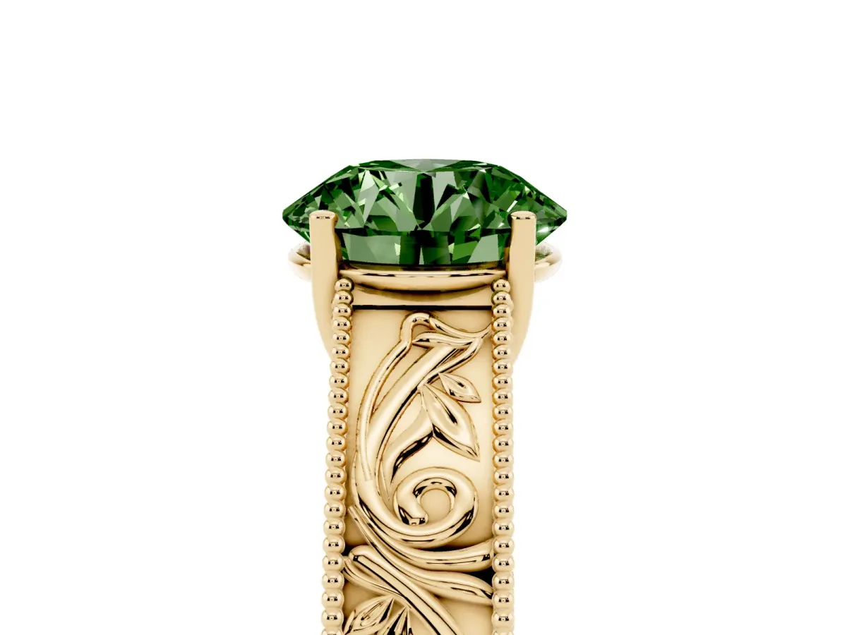 Fancy Green Round Cut Diamond Solitaire Ring with Engraved Band and Four-Prong Setting Yellow gold