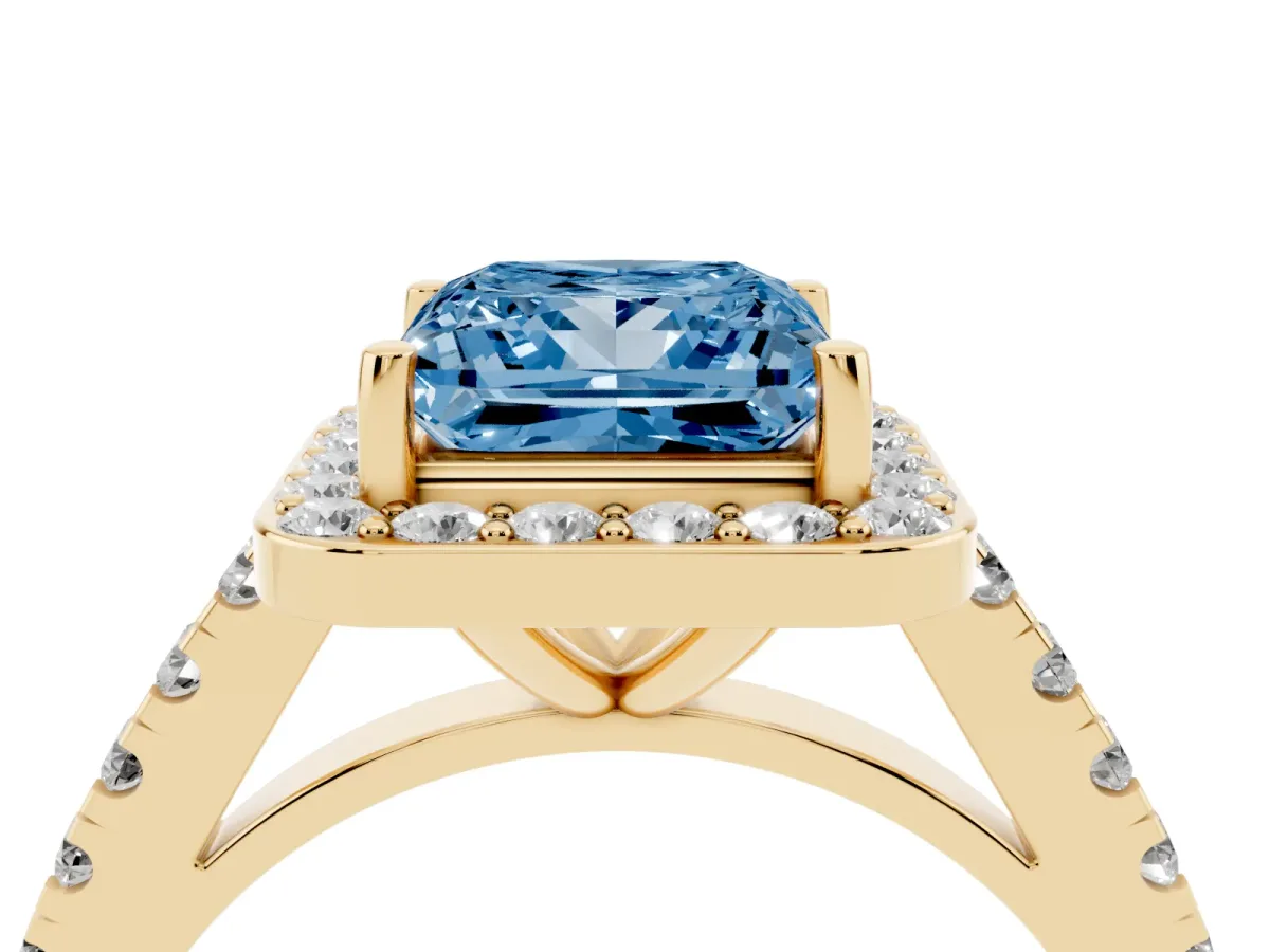 Fancy Blue Princess Cut Diamond Halo Ring with Round Pavé Split Shank and Prong Setting Yellow gold