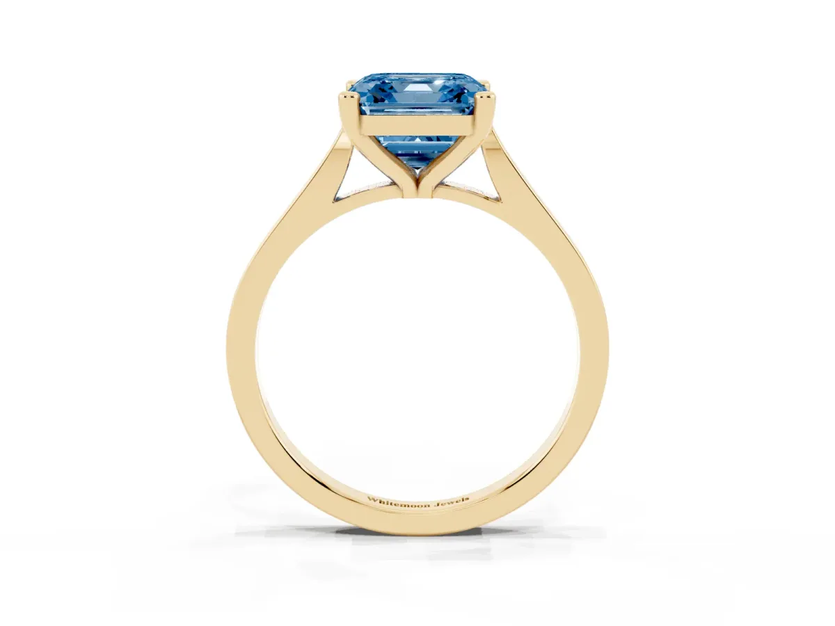 Fancy Blue Asscher Cut Solitaire Diamond Ring with Four-Prong Setting and Tapered Band Yellow gold