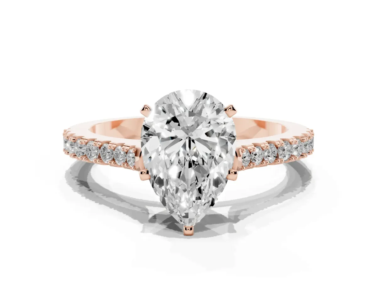 Pear Cut Cut Solitaire Diamond Engagement Ring with Pave Band and Four-Prong Setting Rose gold