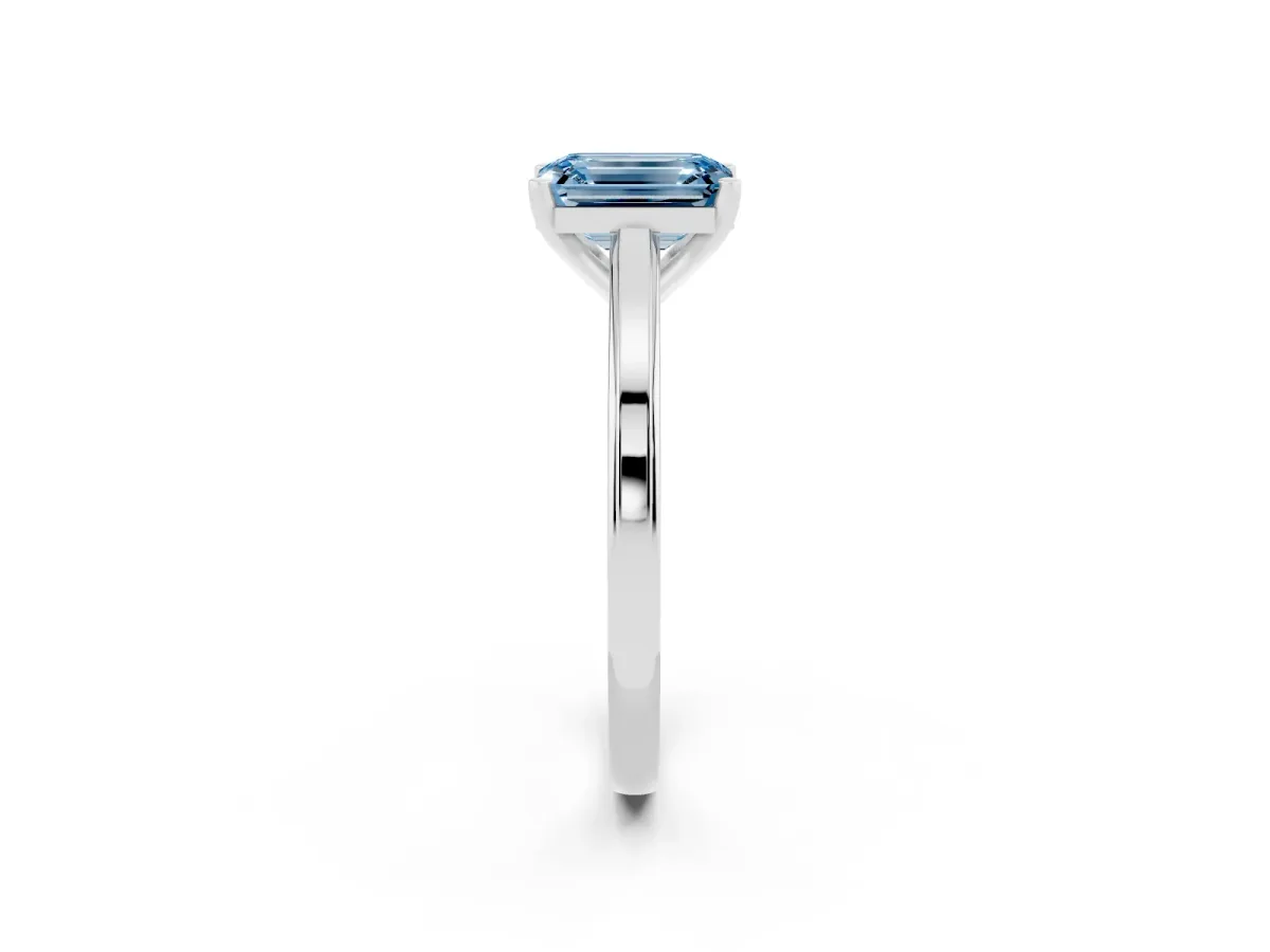 Fancy Blue Emerald Cut Solitaire Diamond Ring with Four-Prong Setting and Classic Band Platinum