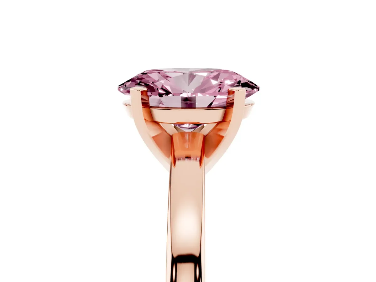 Fancy Pink Oval Cut Solitaire Diamond Engagement Ring with Four-Prong Setting on a Classic Band Rose gold