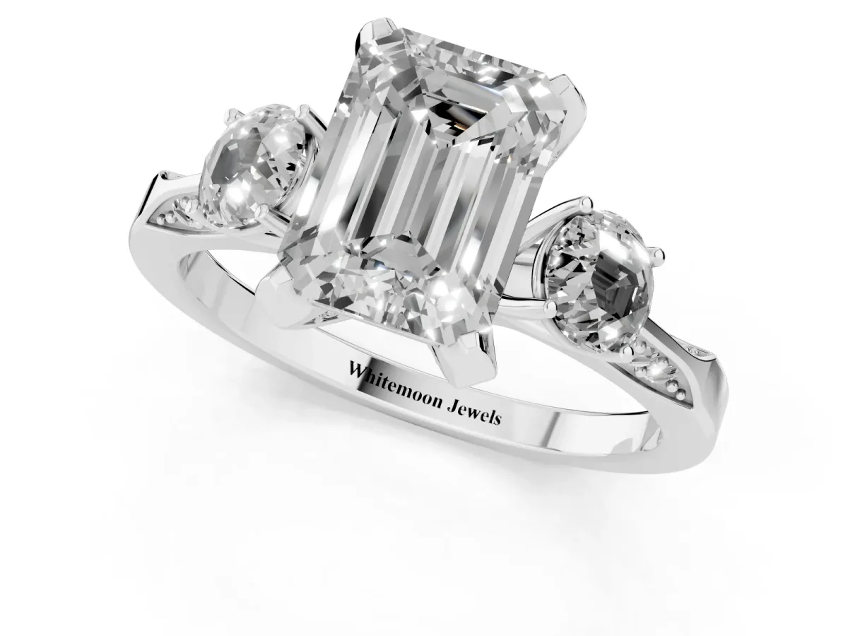 Fancy Blue Emerald Cut Brilliant Three-Stone Diamond Ring with Pavé Band and Four-Prong Setting Silver