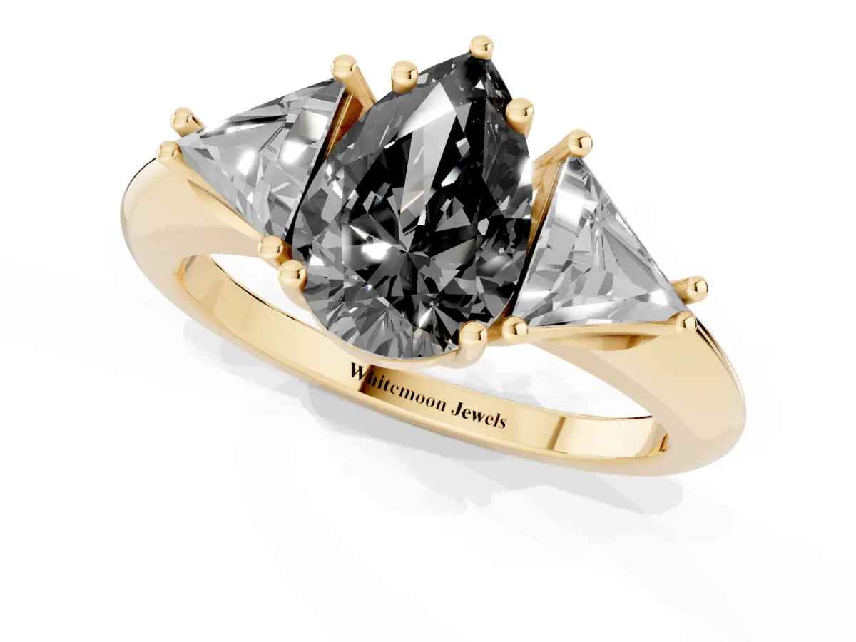 Fancy Black Three-Stone Pear Cut Diamond Engagement Ring with Trillion Side Stones and Prong Setting Yellow gold