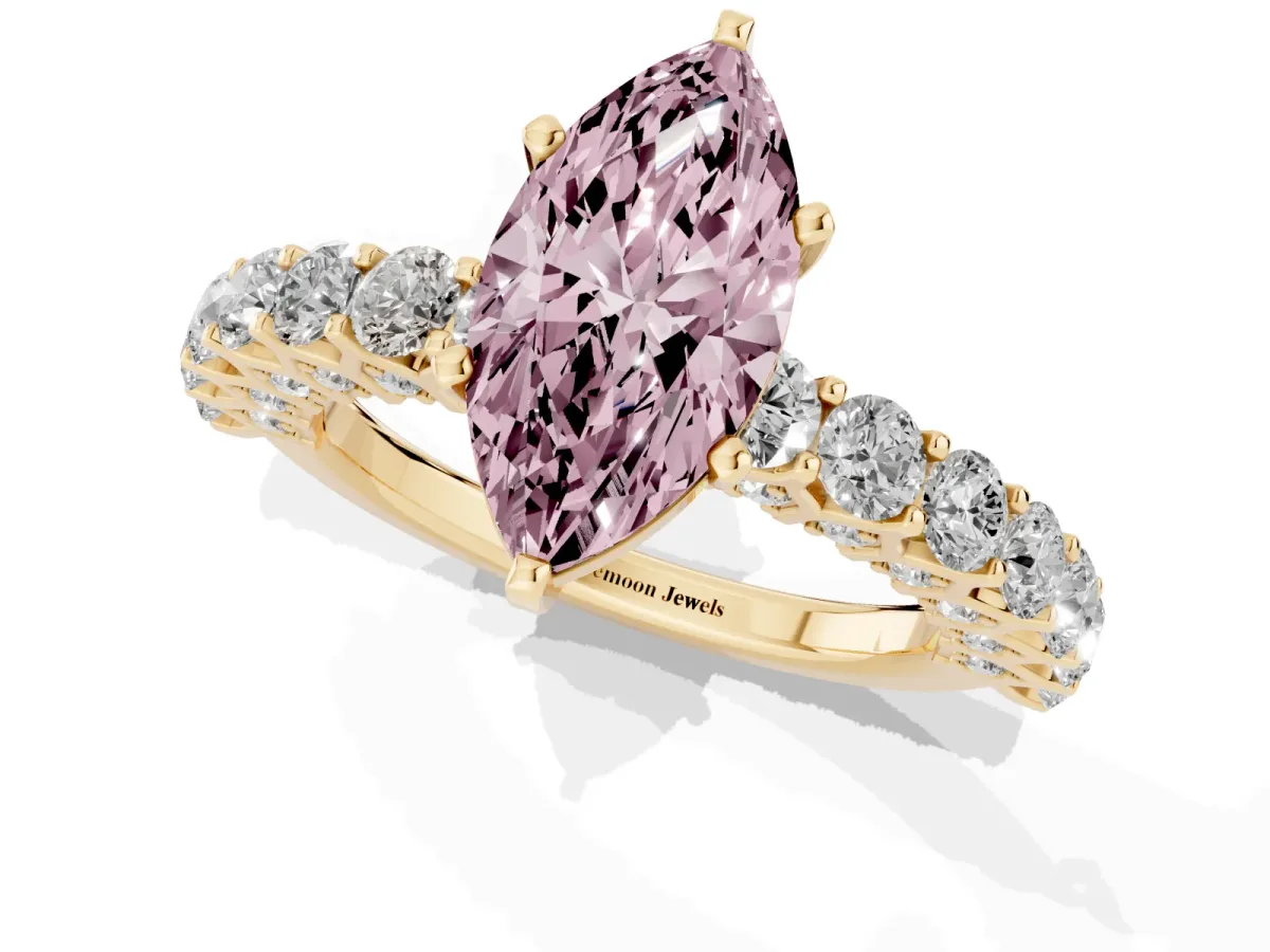 Fancy Pink Marquise Cut Diamond Solitaire Ring with Shared Prong Pavé Band and Four-Prong Setting Yellow gold