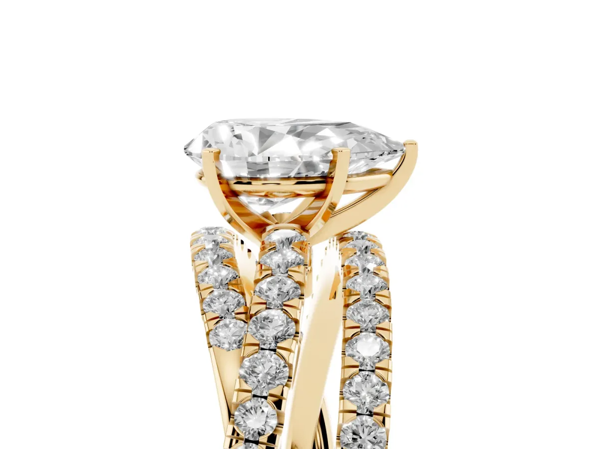 Pear Cut Solitaire Twist Band with Pavé Setting and Four-Prong Setting Yellow gold