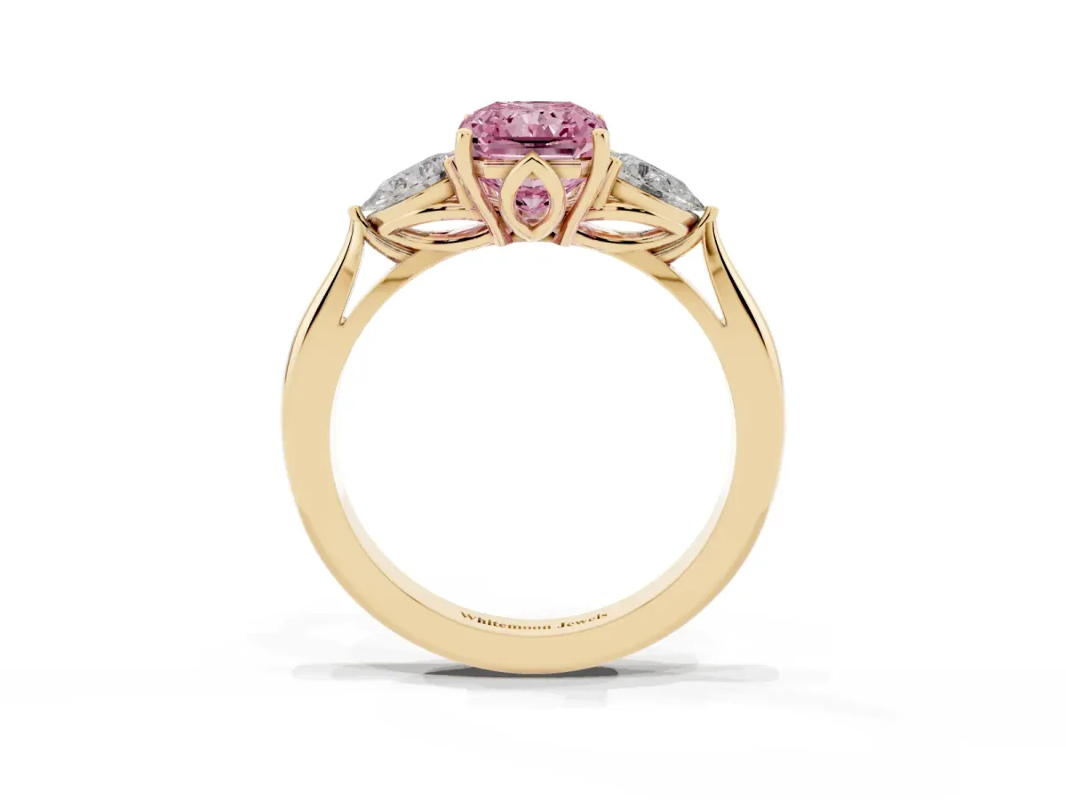 Fancy Pink Three-Stone Radiant Cut Brilliant Diamond Solitaire Ring with Tapered Band and Four-Prong Setting Yellow gold
