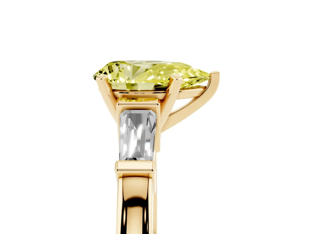 Fancy Yellow Pear Cut Cut Diamond Solitaire Ring with Tapered Baguette Accents and Four-Prong Setting Yellow gold