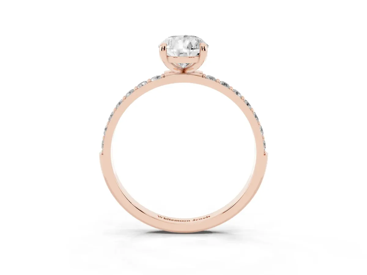Pear Cut Diamond Solitaire Ring with Round Pavé Band and Prong Setting Rose gold