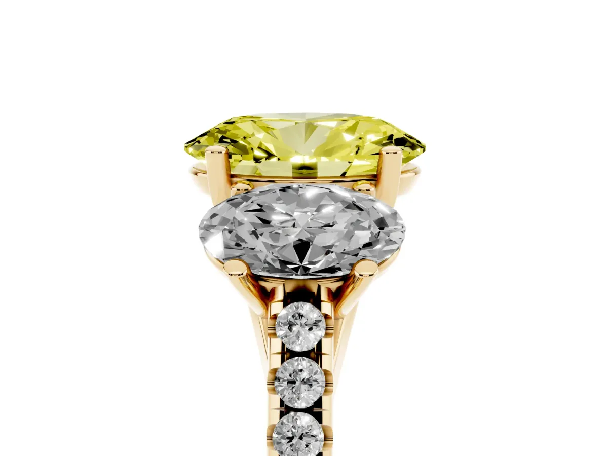 Fancy Yellow Three-Stone Oval Cut Diamond Ring with Round Pavé Band and Prong Setting Yellow gold