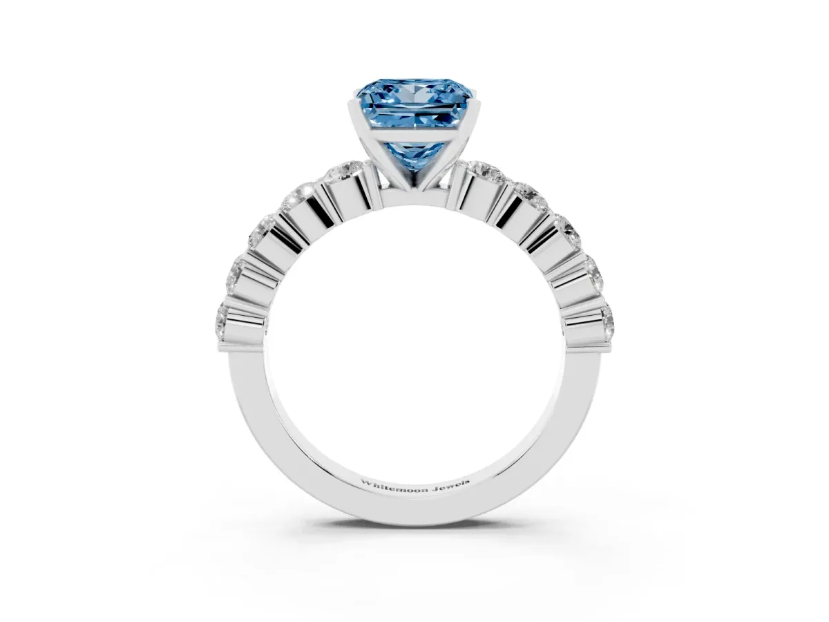 Fancy Blue Princess Cut Diamond Solitaire Ring with Shared Prong Round Side Stones Platinum