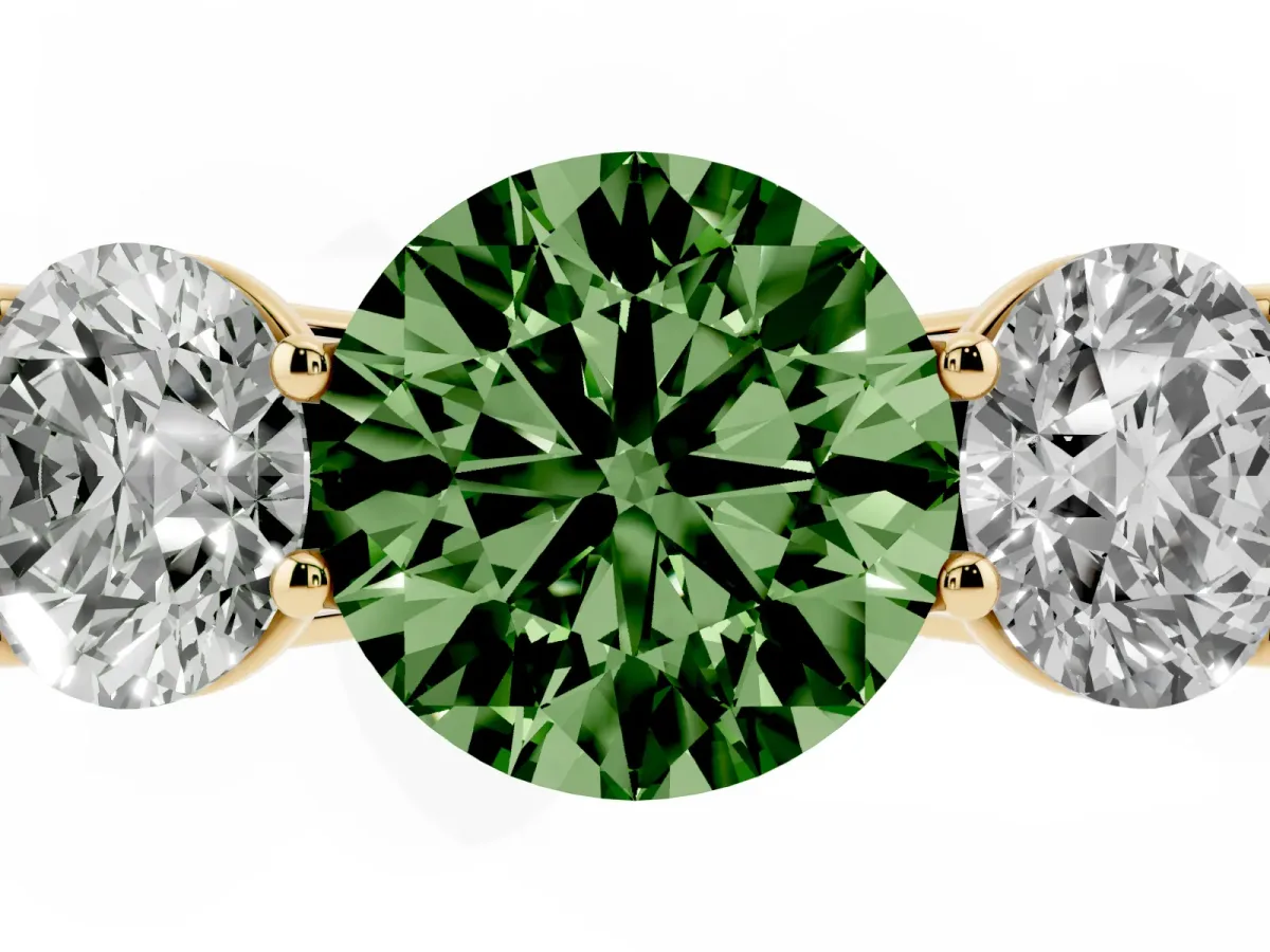Fancy Green Round Cut Three-Stone Diamond Ring with Prong Setting on a Classic Band Yellow gold