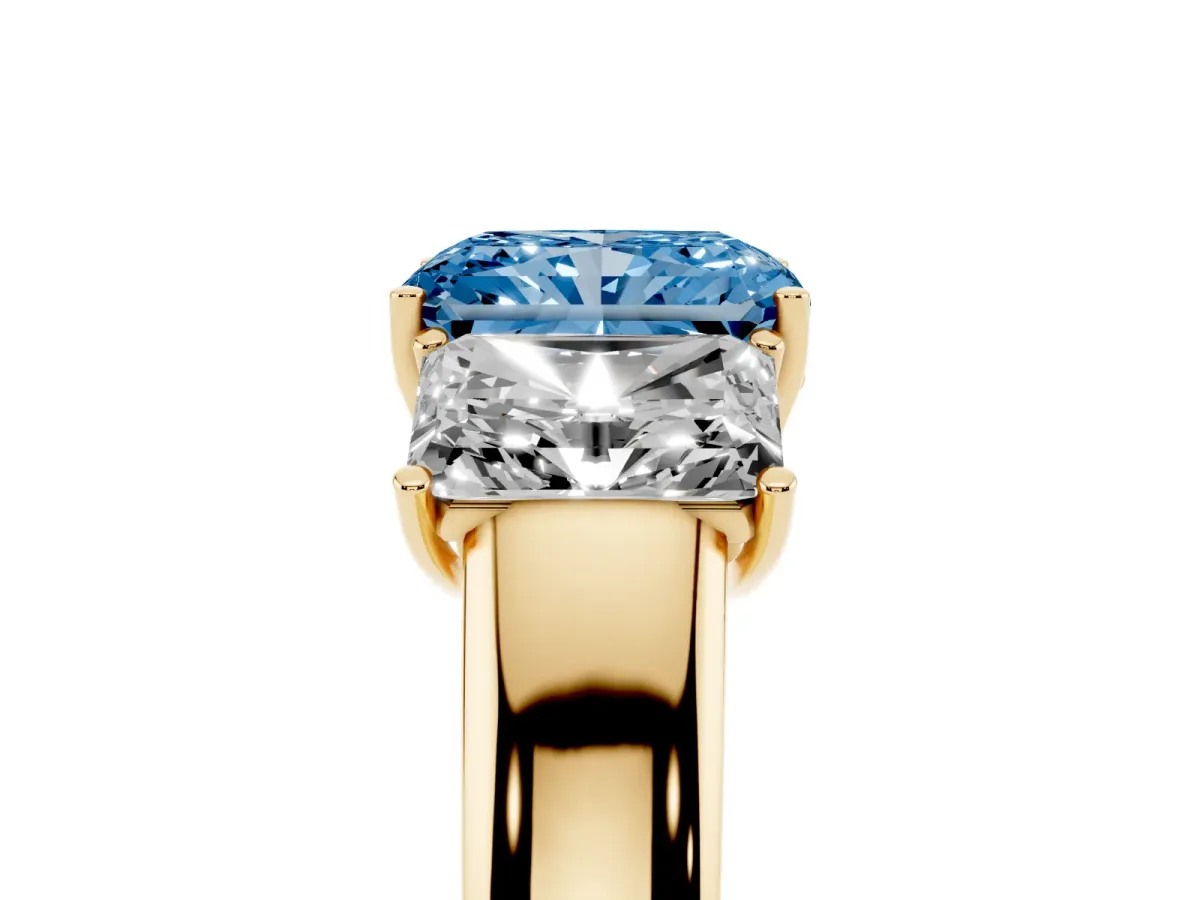 Fancy Blue Three-Stone Radiant Cut Cut Diamond Ring with Prong Setting and Classic Band Yellow gold