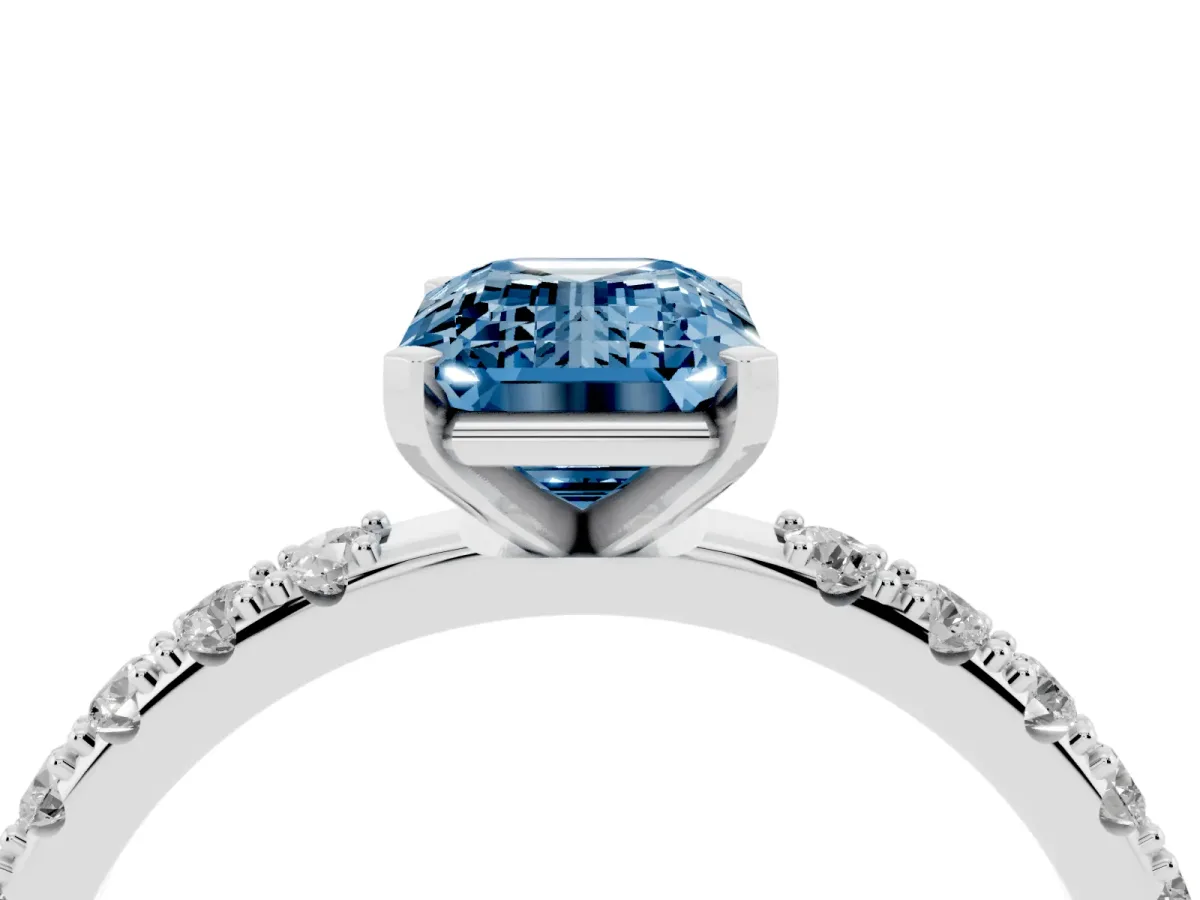 Fancy Blue Emerald Cut Diamond Solitaire Pavé Band with Four-Prong Setting Platinum