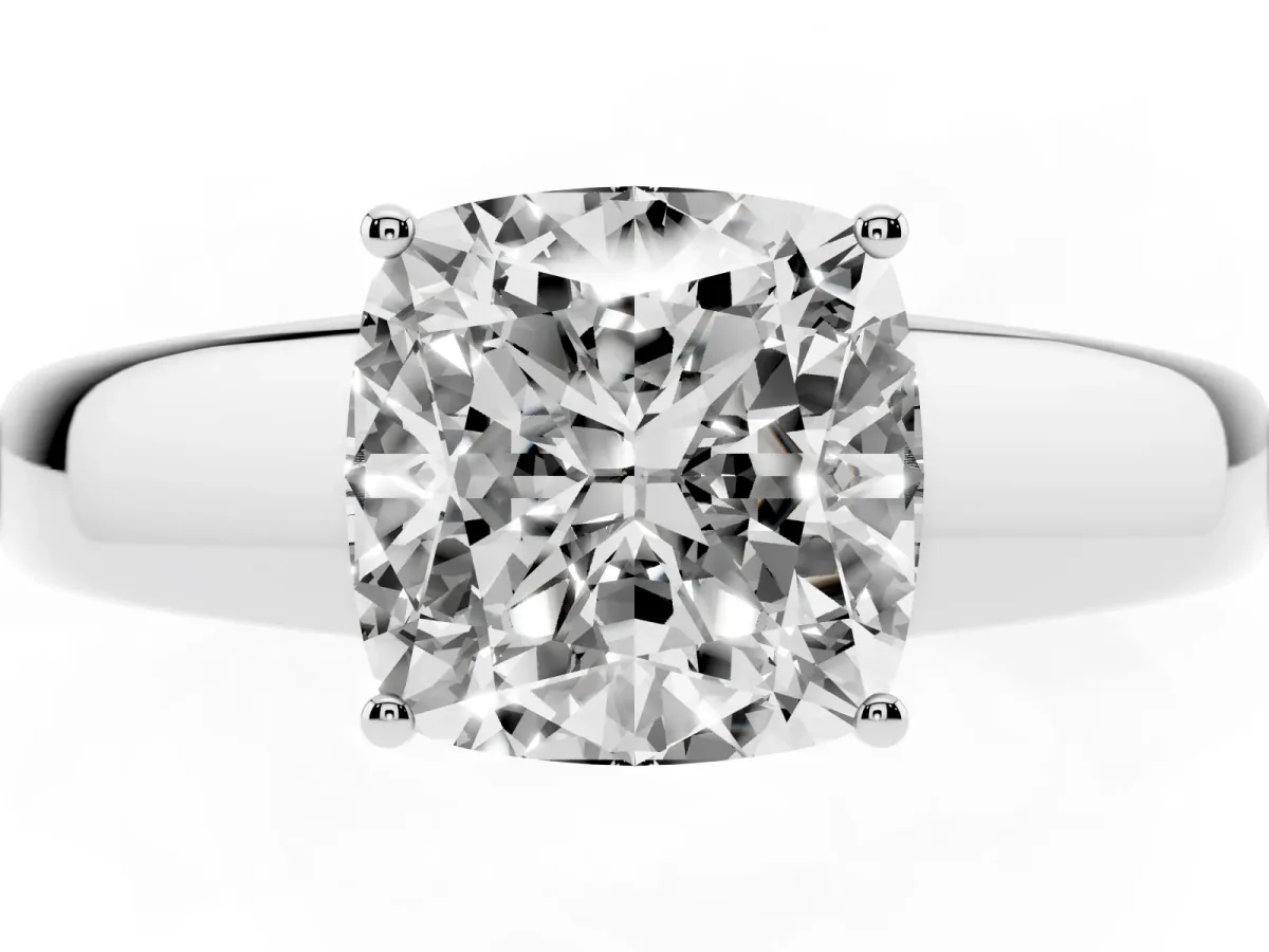 Cushion Cut Solitaire Diamond Ring with Tapered Band and Four-Prong Setting Silver